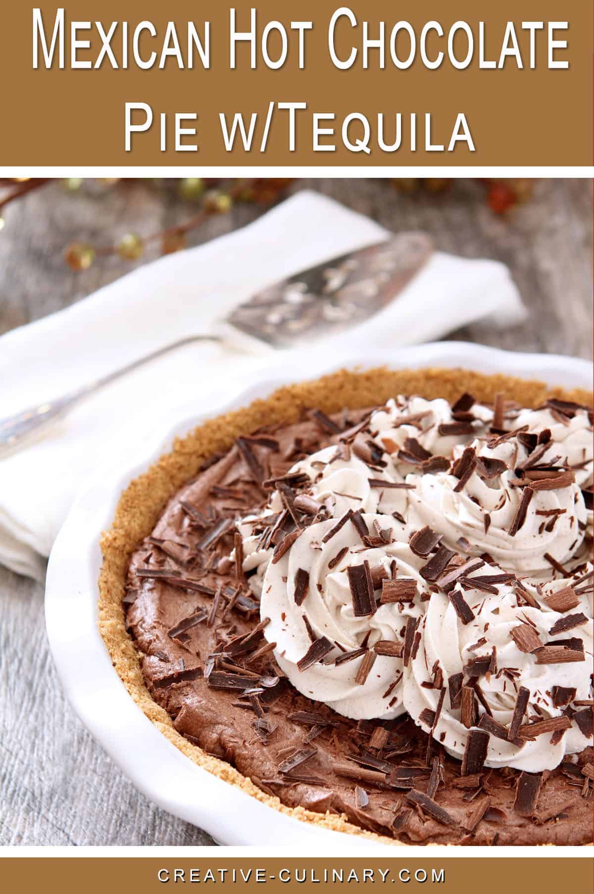 Pin for Mexican Hot Chocolate Pie - A French Silk Pie with tequila, cinnamon, and a touch of pepper; served in a white pie plate and decorated with whipped cream and shaved chocolate.