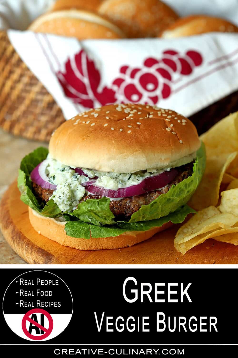 Greek veggie burger with lettuce, onion, and Tzatziki Sauce on a bun.